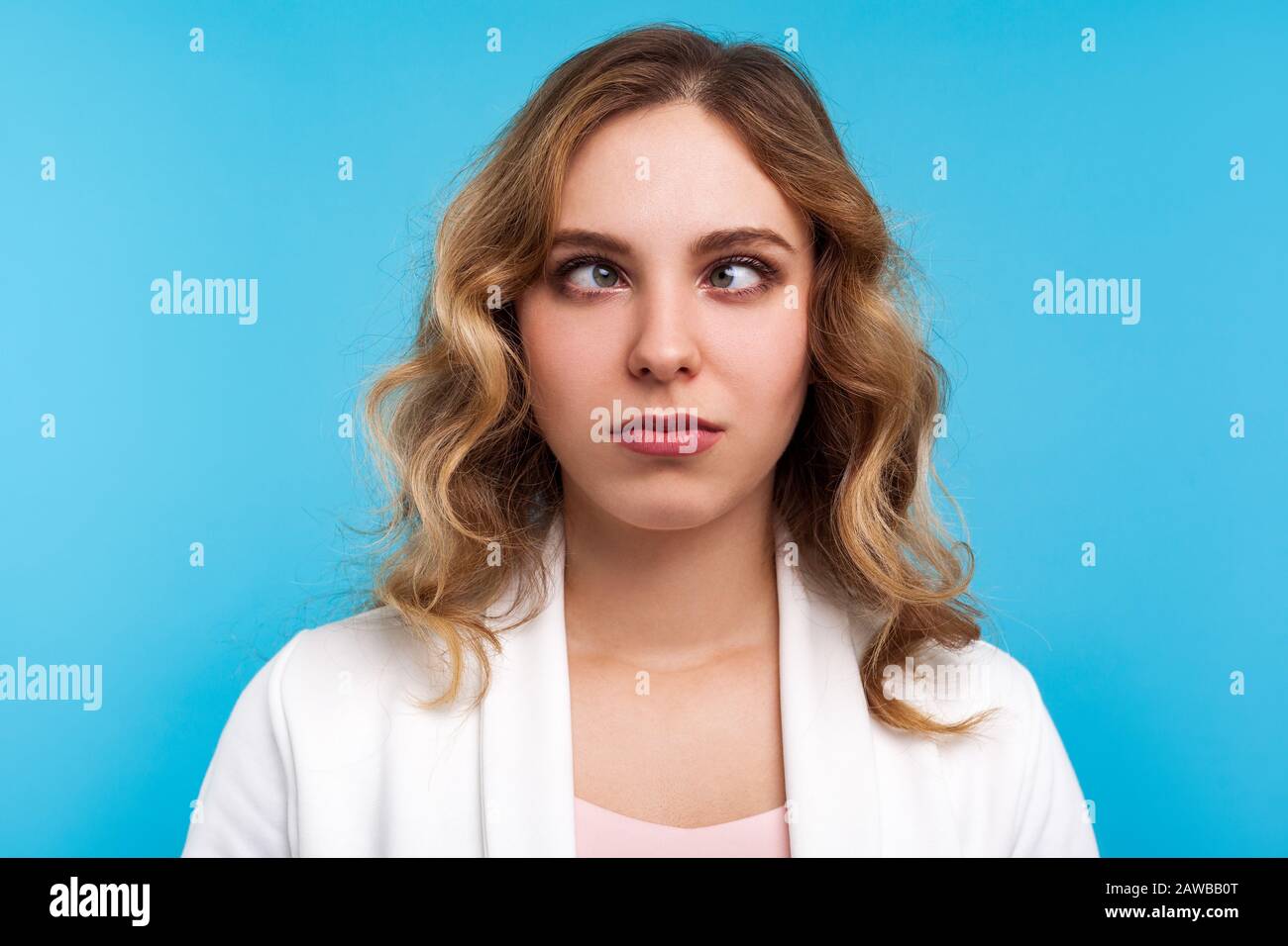 Cross eyed squinting expression young hires stock photography and