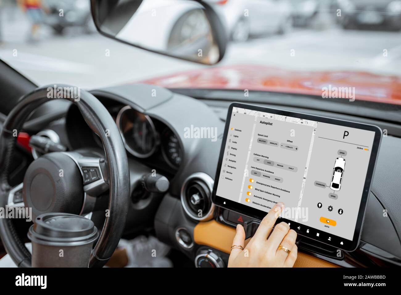 Woman controlling car with a digital dashboard switching autopilot mode