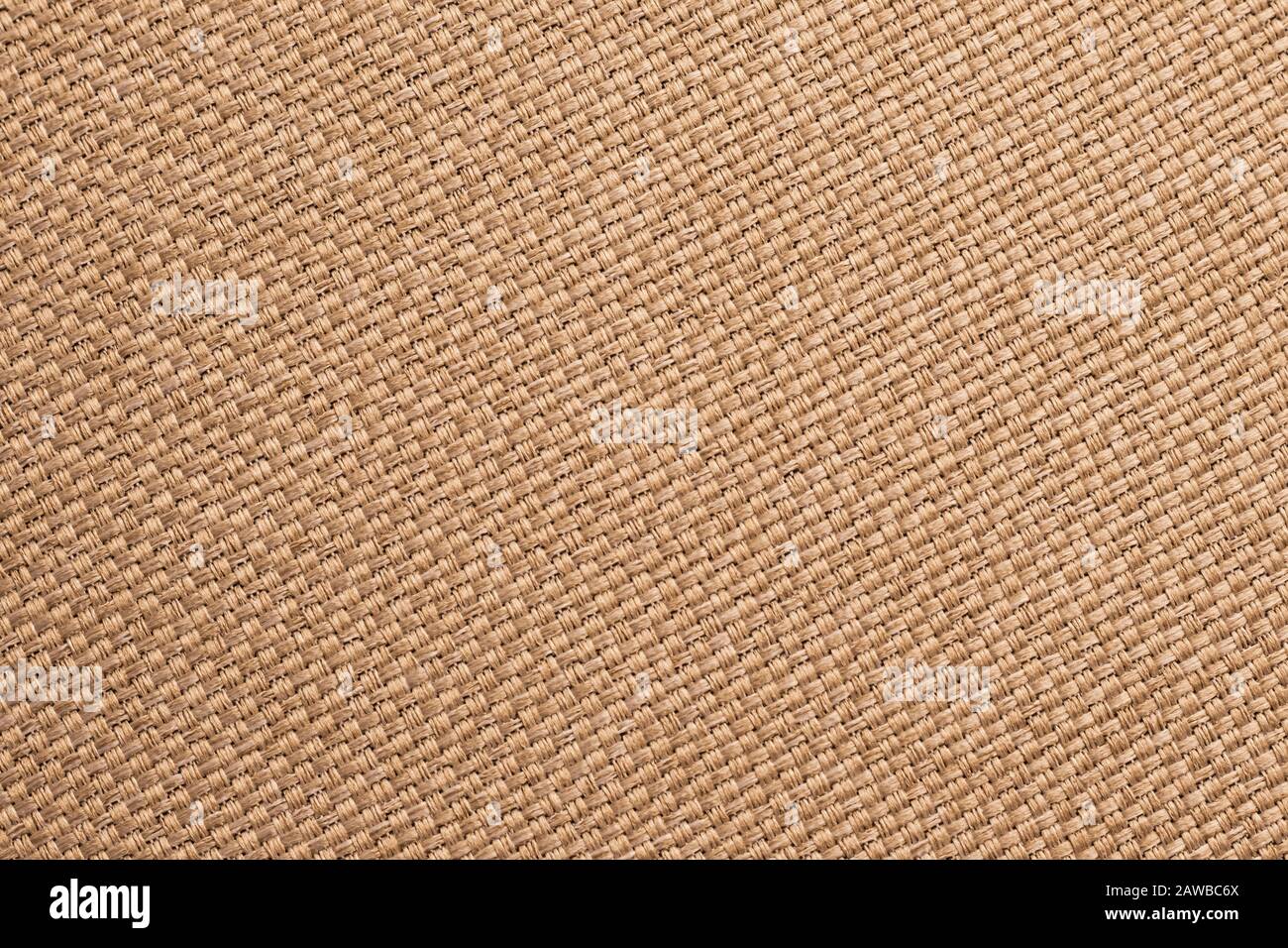 Texture of burlap, brown woven fabric background. Sackcloth surface, sacking material, bagging textile wallpaper close-up Stock Photo