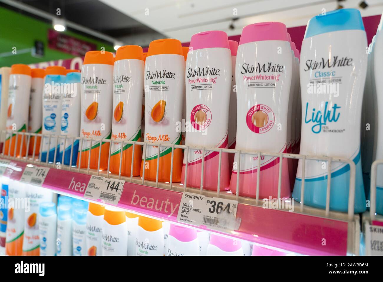Skin whitening products within a Philippine supermarket.Commonly used in South East Asian countries where whiter skin is considered by many to be a be Stock Photo