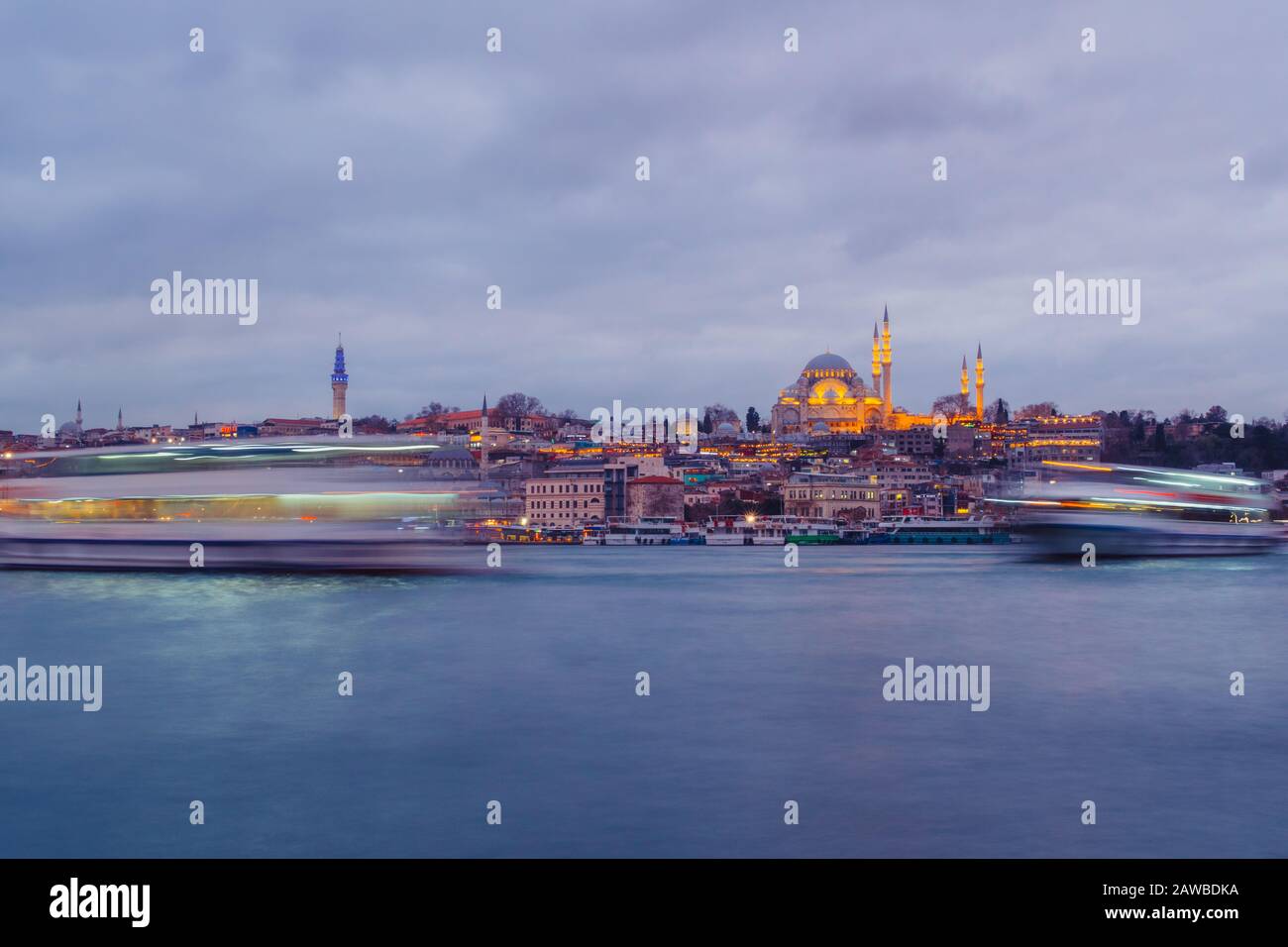 Istanbul, Turkey - Jan 16, 2020: Suleymaniye mosque and passengers Ferry at the Golden Horn, Istanbul, Turkey. Stock Photo