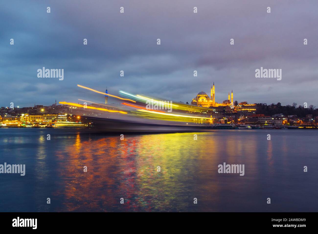 Istanbul, Turkey - Jan 16, 2020: Suleymaniye mosque and passengers Ferry at the Golden Horn, Istanbul, Turkey. Stock Photo