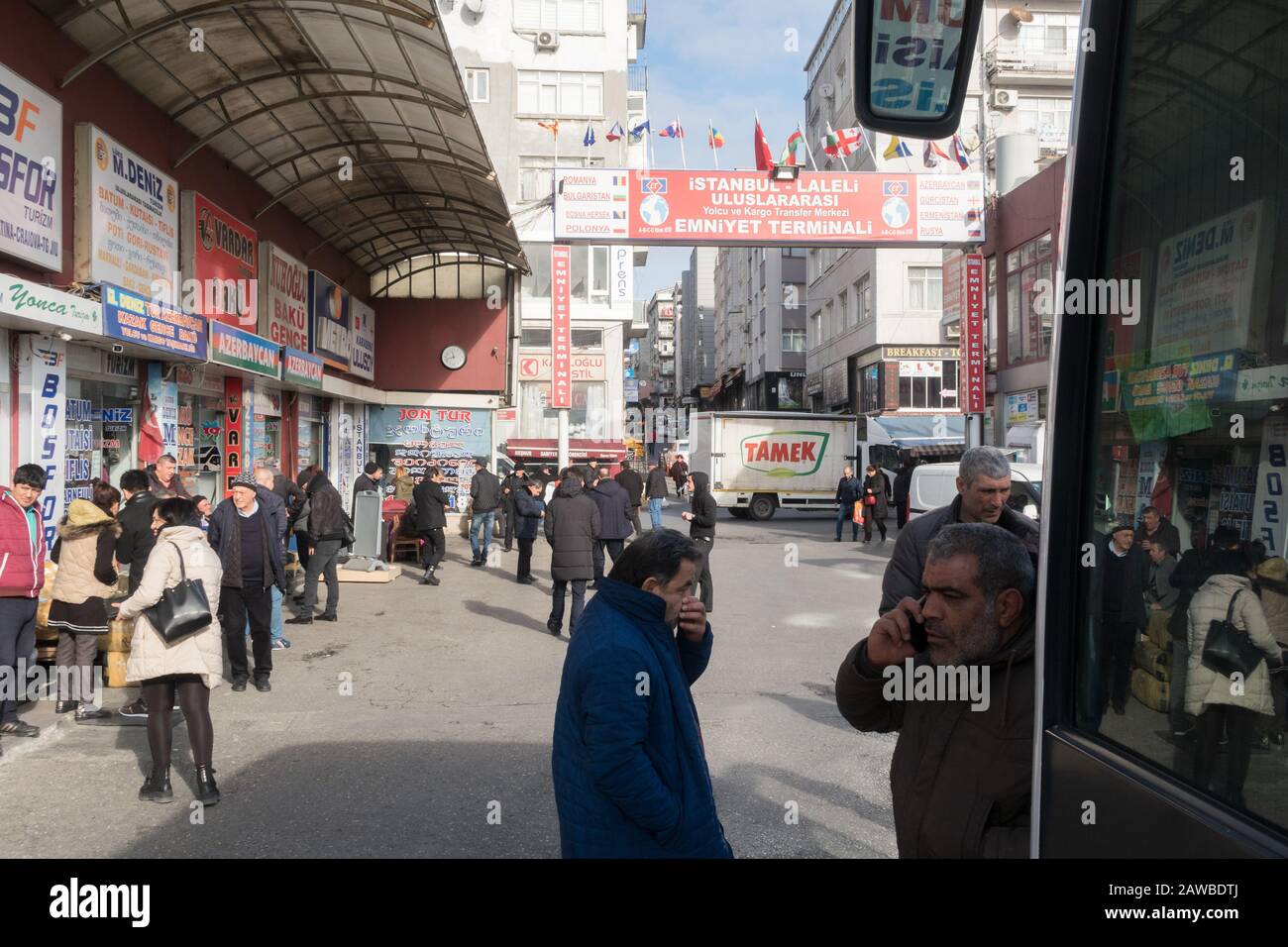 Istanbul, Turkey - Jan 17, 2020: Tourists traveling to the Balkans, Armenia, Georgia or Iran wait to board a coach and load their bags at the bus term Stock Photo