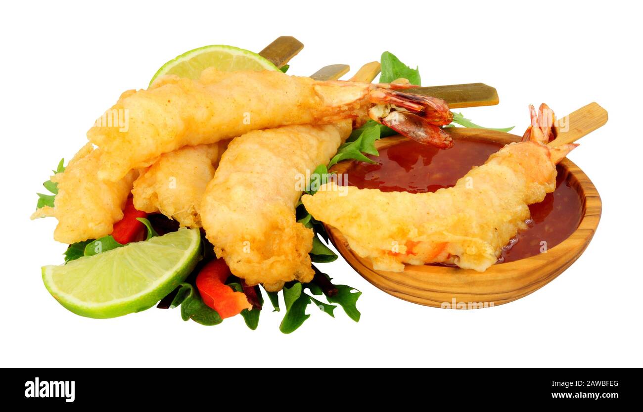 Tempura battered king tiger prawns on wooden skewers with chilli sauce