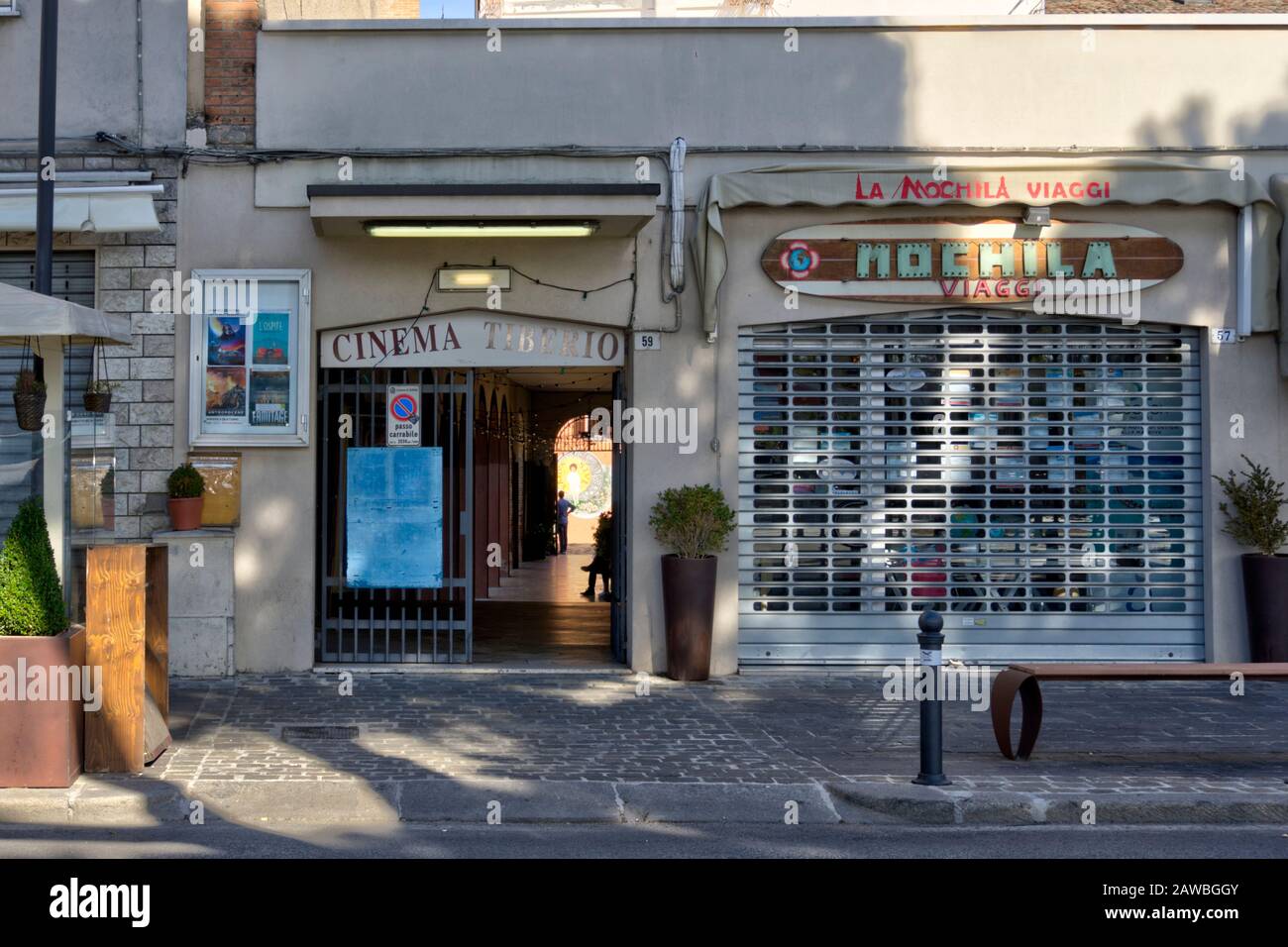 Rimini, Italy - October 20, 2019: Facade of street entrance to cinema house  (Cinema Tiberio) and travel agency (Mochila Viaggi Stock Photo - Alamy