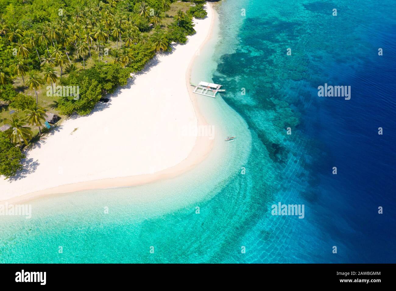 White sand beach and blue sea. view from above. Mahaba Island, Philippines. Summer and travel vacation concept. Stock Photo