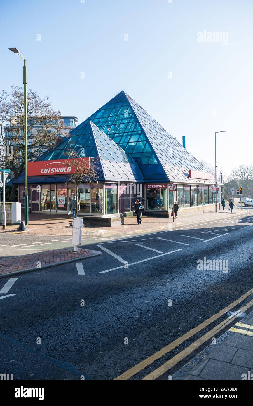 The blue glass pyramid, home to the Cotswold outdoor clothing and camping equipment shop, High Street, Watford, Hertfordshire, England, UK Stock Photo