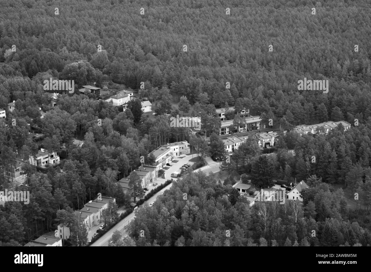 Aerial view over houses and forests in Tallinn Estonia. panoramic landscape black and white Stock Photo