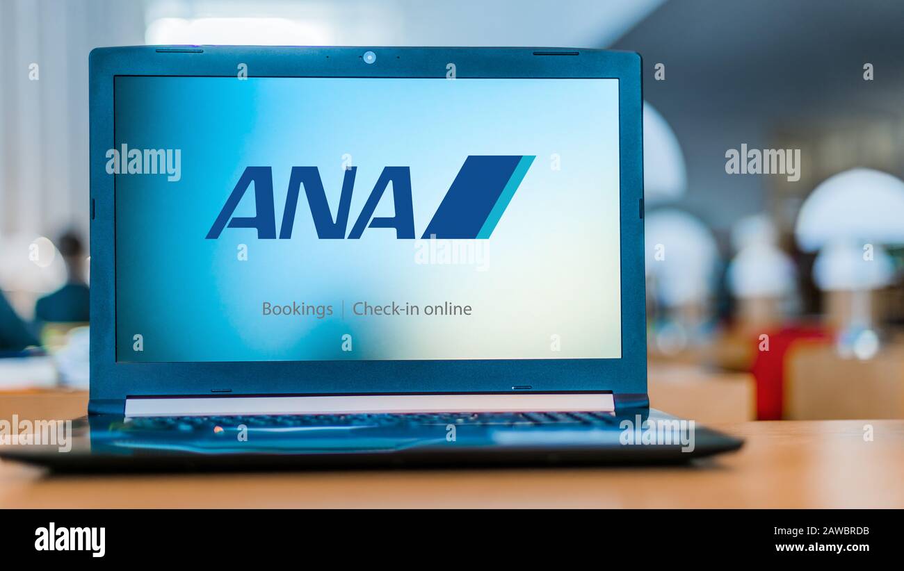 POZNAN, POL - DEC 11, 2019: Laptop computer displaying logo of All Nippon Airways Co., also known as Zennikku, headquartered in Tokyo Stock Photo