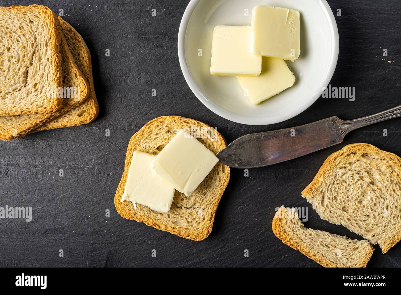Dry toast and butter. Close-up. Stock Photo