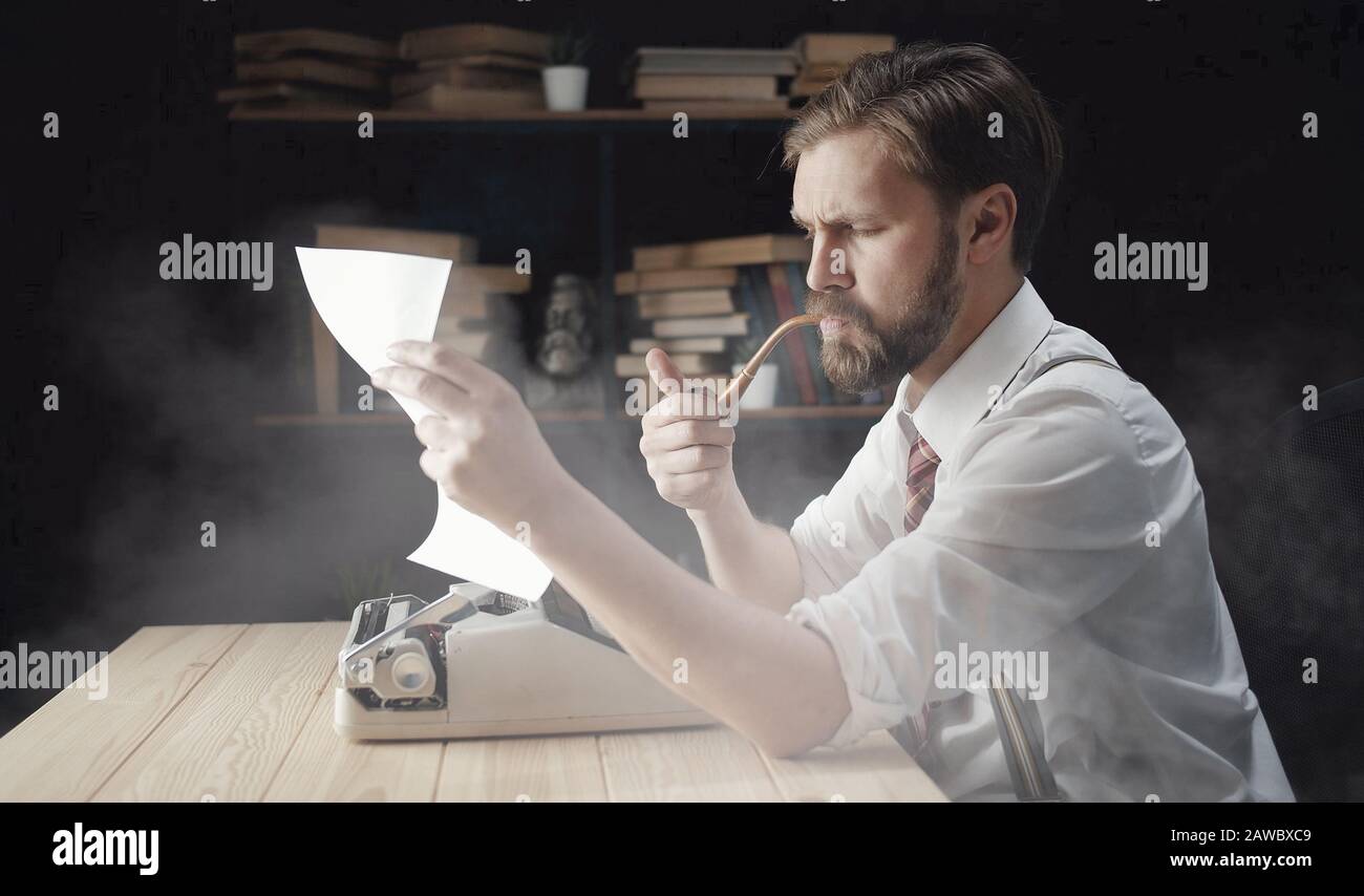 Novelist looking at typescript Stock Photo