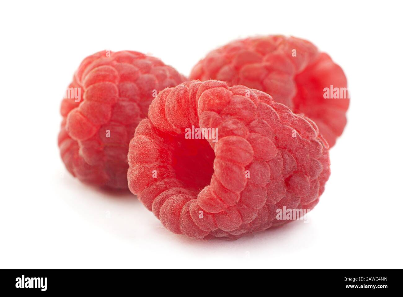 Raspberry fruit closeup isolated on white background Stock Photo - Alamy