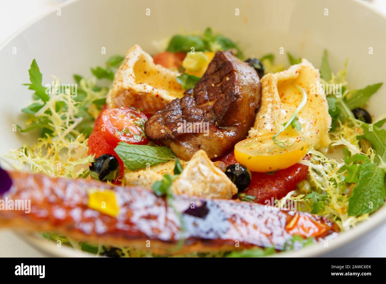 Appetizer of fried foie gras, camembert cheese and sweet bread, close-up Stock Photo
