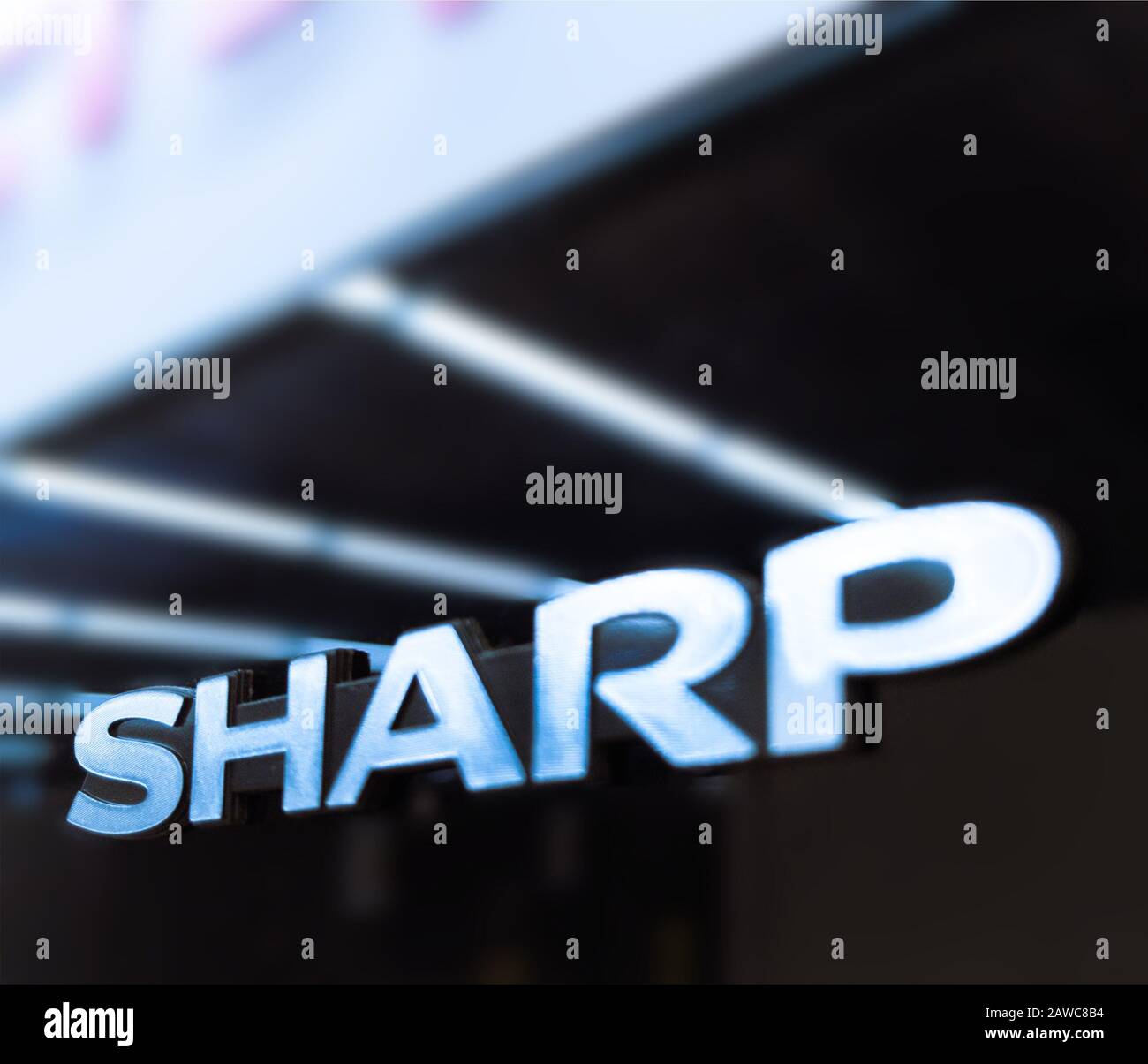 logotype of the Sharp corp, placed on storefront Stock Photo