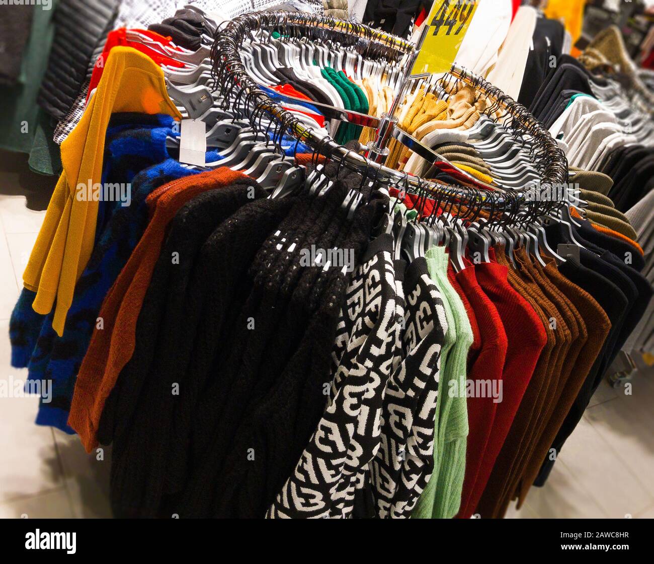 round coatrack in clothe store Stock Photo