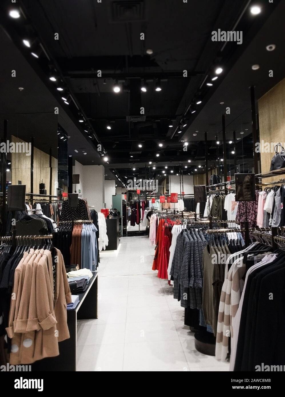 dark interior of clothe store Stock Photo - Alamy