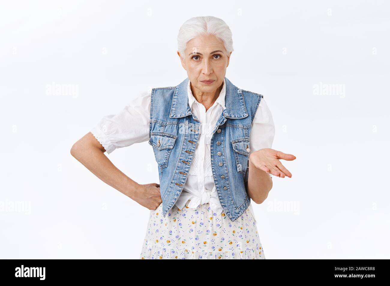Annoyed serious-looking impatient senior woman cant understand what ...