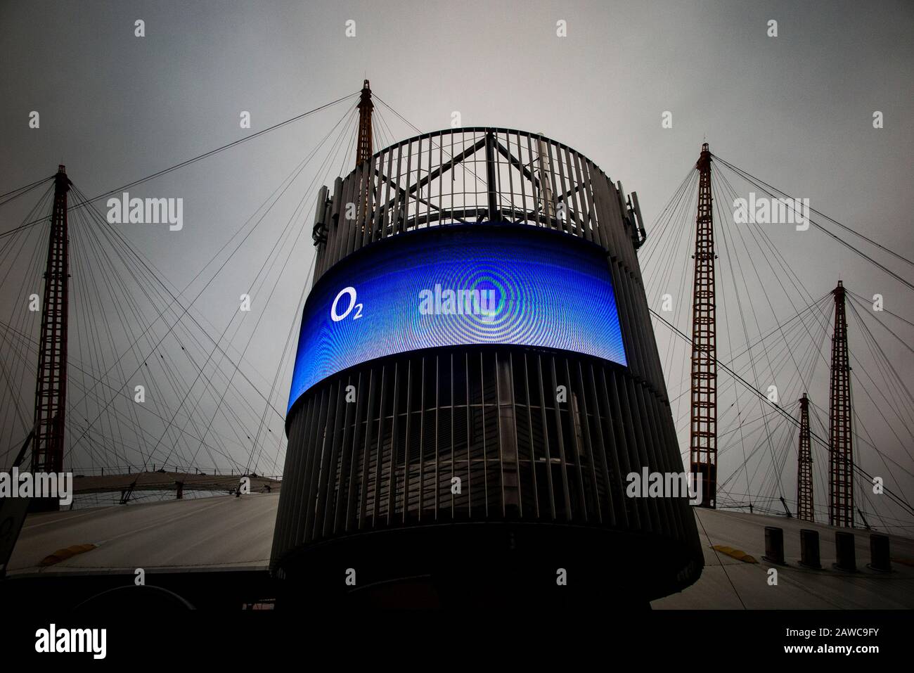 The exterior of the O2 Millennium Dome in North Greenwich, London with an electronic advertising hoarding from O2 Stock Photo