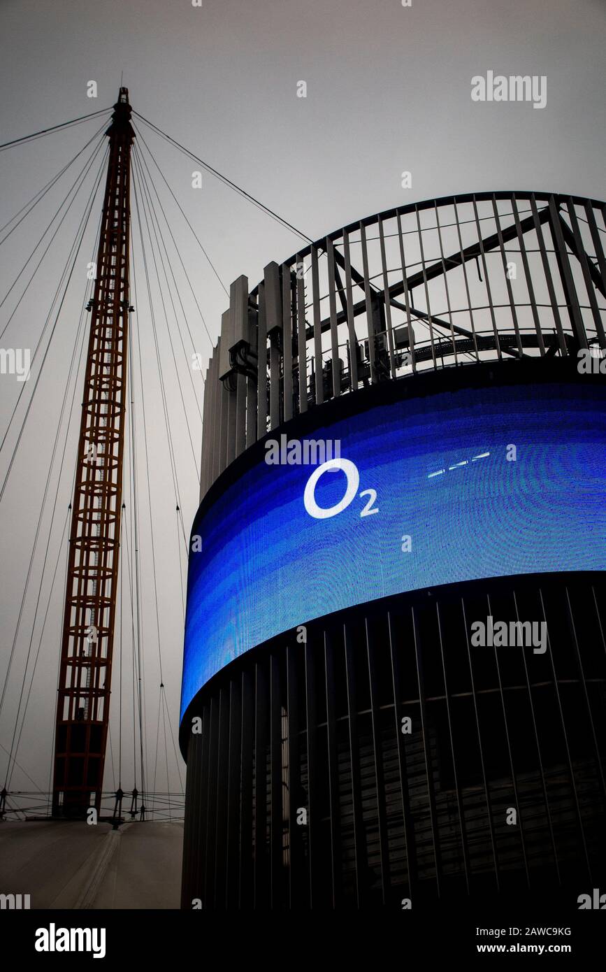 The exterior of the O2 Millennium Dome in North Greenwich, London with an electronic advertising hoarding from O2 Stock Photo