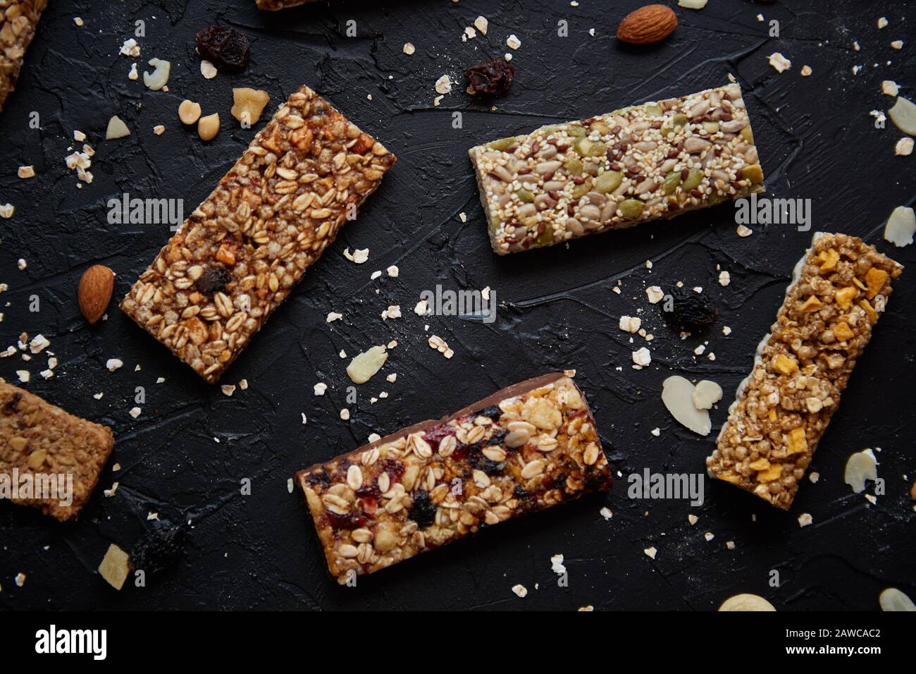 Homemade gluten free granola bars with mixed nuts, seeds, dried fruits
