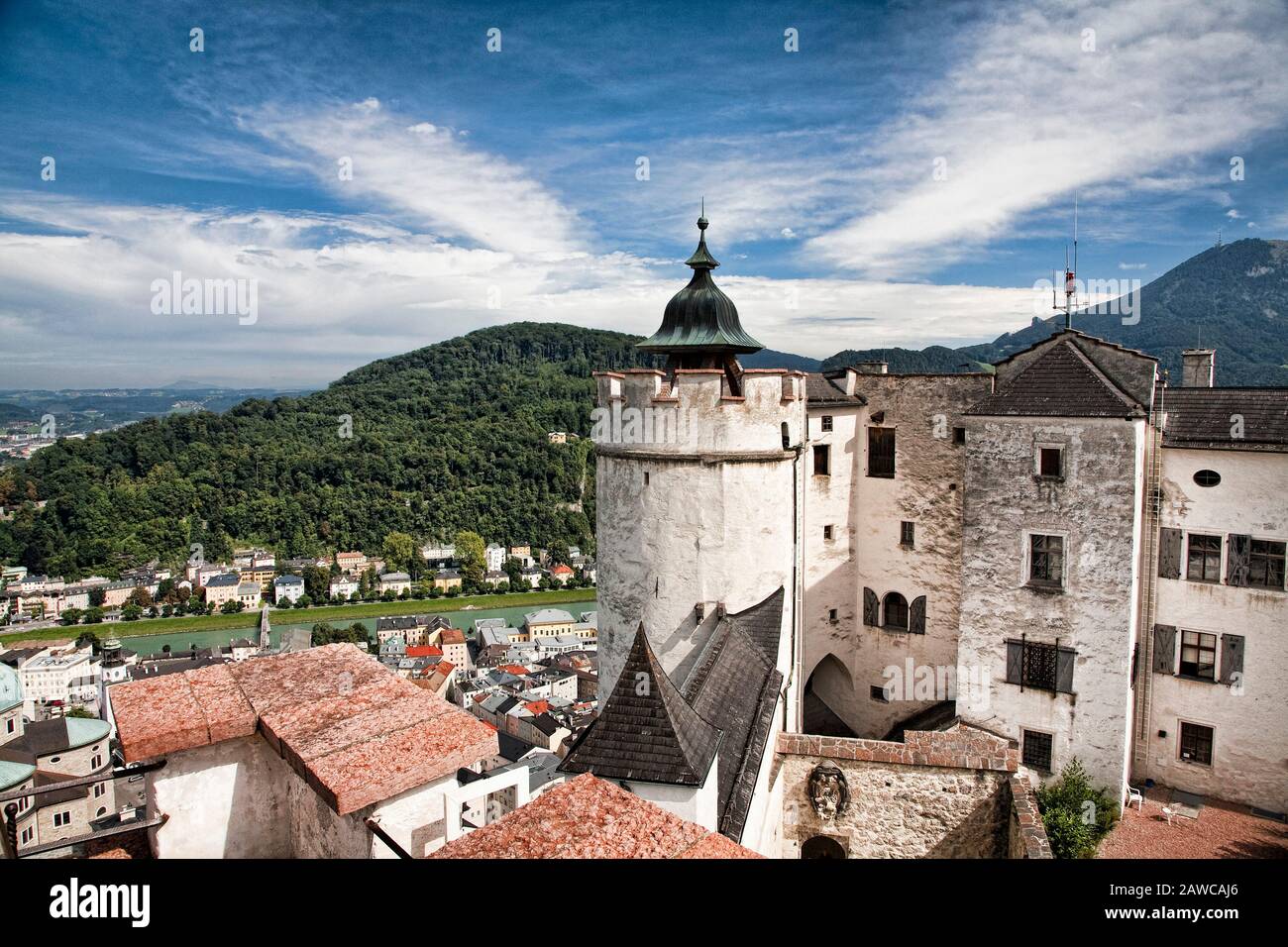 Hohensalzburg fortress sits high on a hill overlooking Salzburg Austria  Stock Photo - Alamy