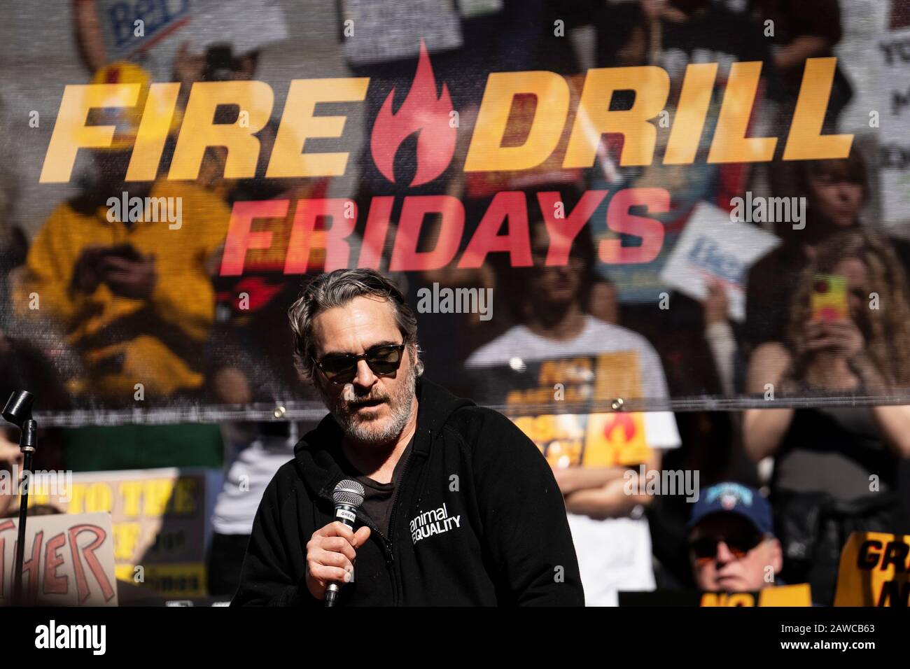 Actor Joaquin Phoenix speaks during a Fire Drill Friday's climate change rally outside the Los Angeles City Hall. Stock Photo
