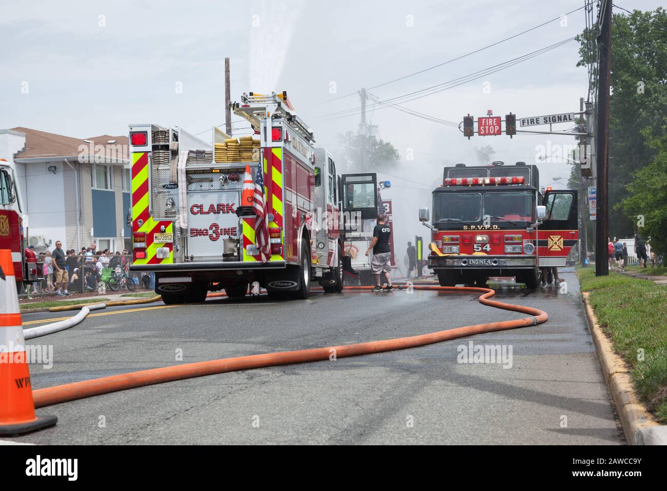 COLONIA, NEW JERSEY / UNITED STATES - June 6, 2015: Fire trucks from various towns participating in the2015 Colonia Fire Department wet down. Stock Photo