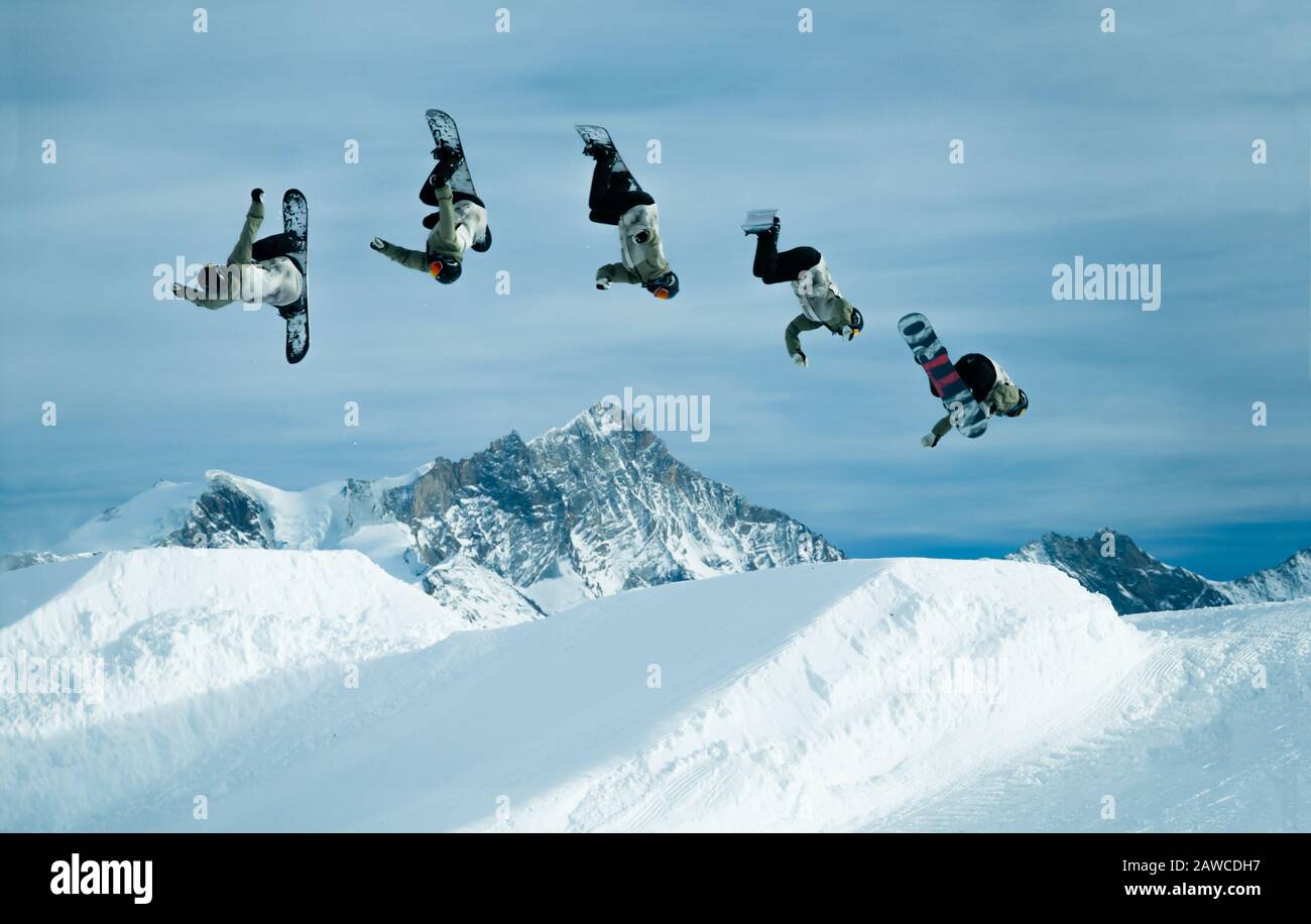 Snowboard jump over Weisshorn. Bendolla, Val d'anniviers, Switzerland Stock Photo