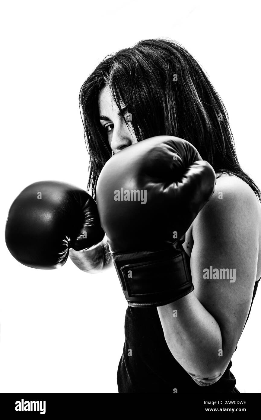 girl with boxing gloves in defiant pose Stock Photo Alamy