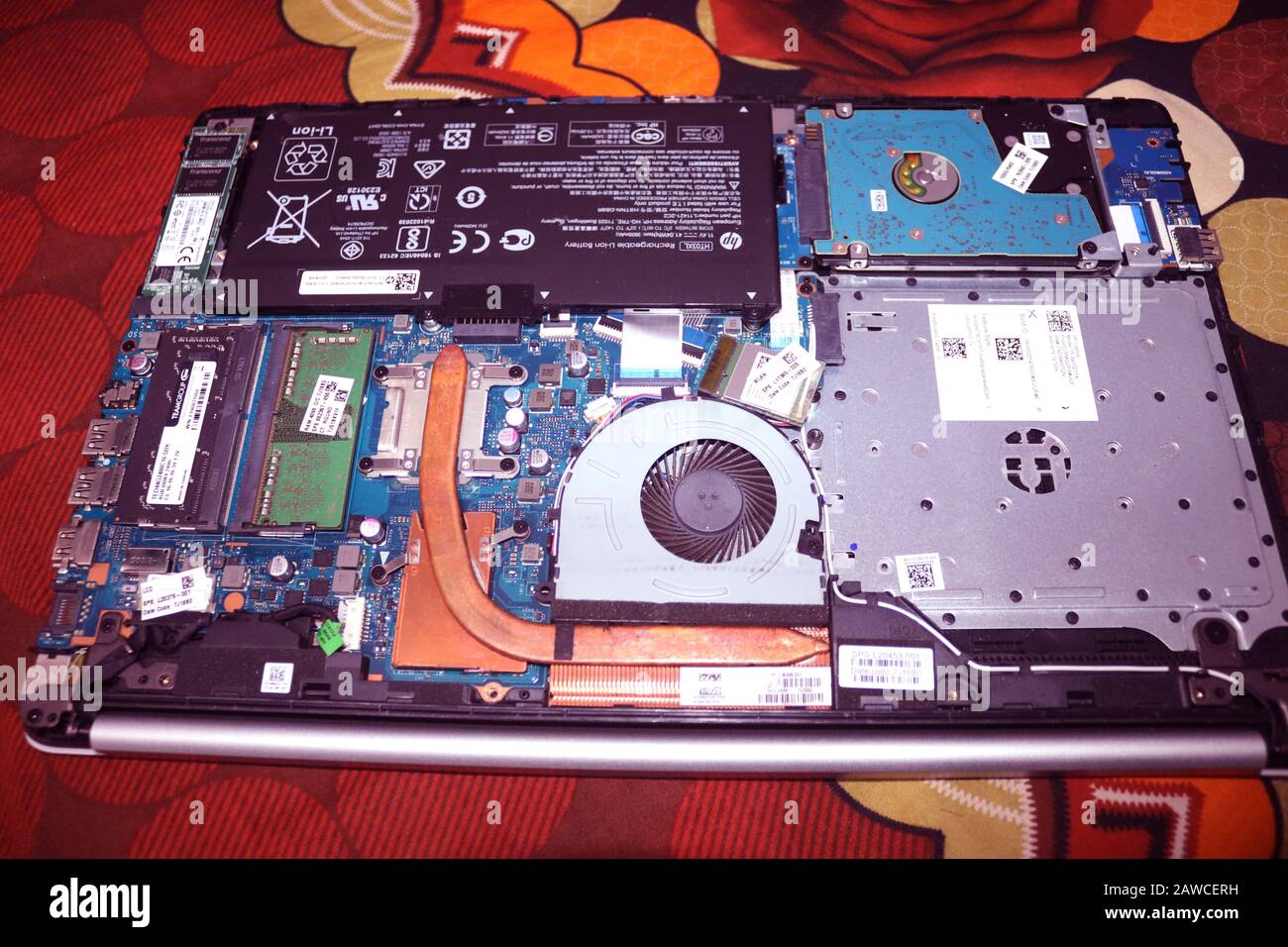 Laptop All Parts when uncover.Laptop Battery,Processor,Hard disk,Ram and  Fan.Computer repair.Electronic service center.Technician support upgrade  part Stock Photo - Alamy
