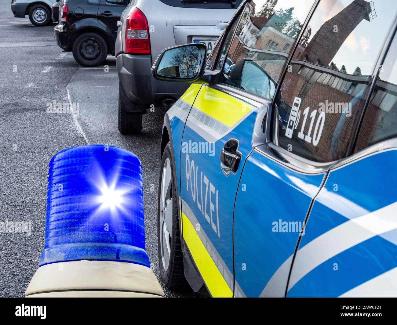 German police car with flashing lights Stock Photo
