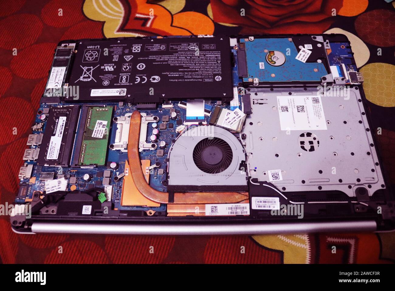 Laptop All Parts when uncover.Laptop Battery,Processor,Hard disk,Ram
