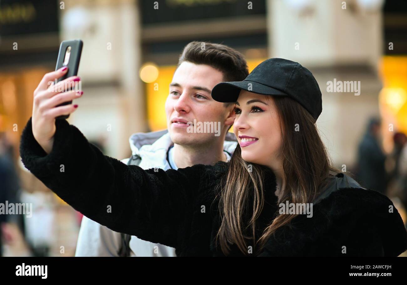 Couple of turists taking a selfie in the city Stock Photo