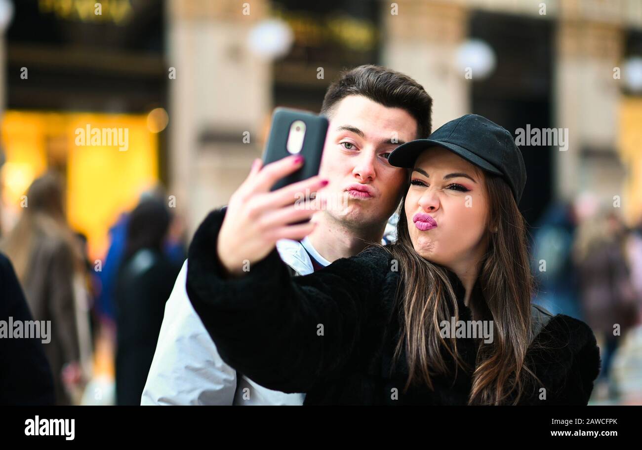Couple of turists taking a selfie in the city Stock Photo