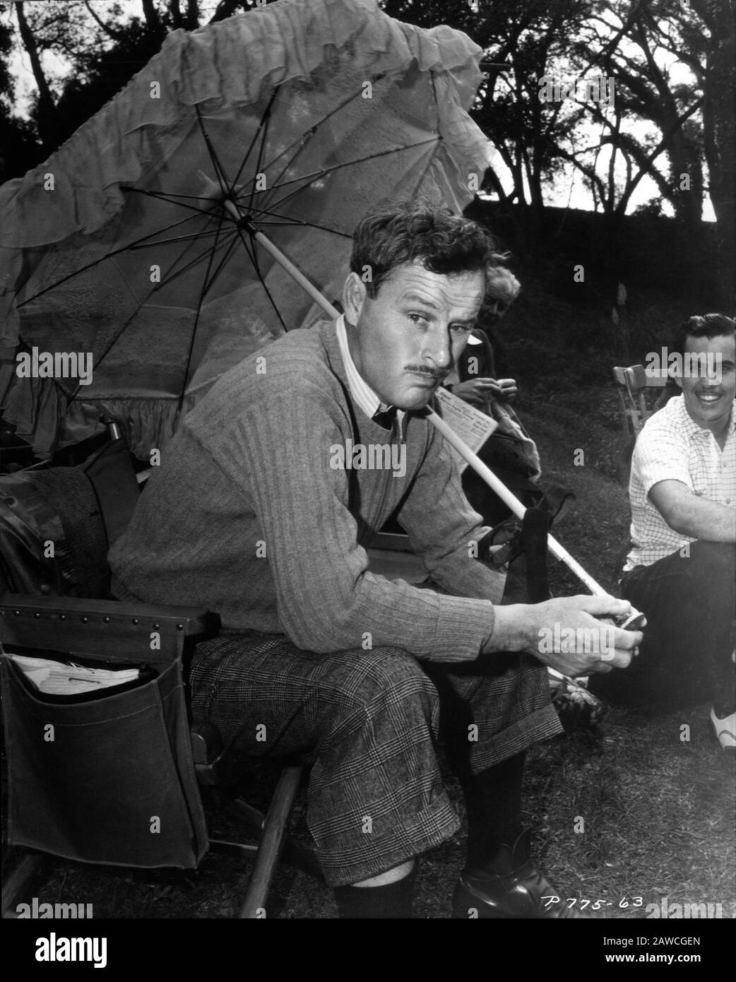 Director WILLIAM A. WELLMAN on set location candid with parasol during filming of BEAU GESTE 1939 novel P.C. WREN Paramount Pictures Corporation Stock Photo