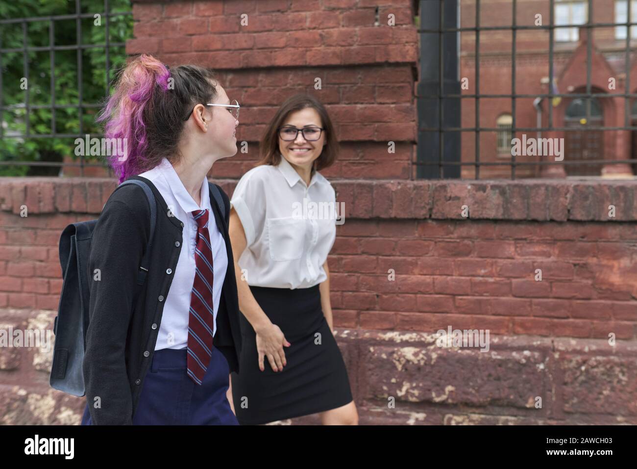 Teacher student talking hallway hi-res stock photography and images - Alamy