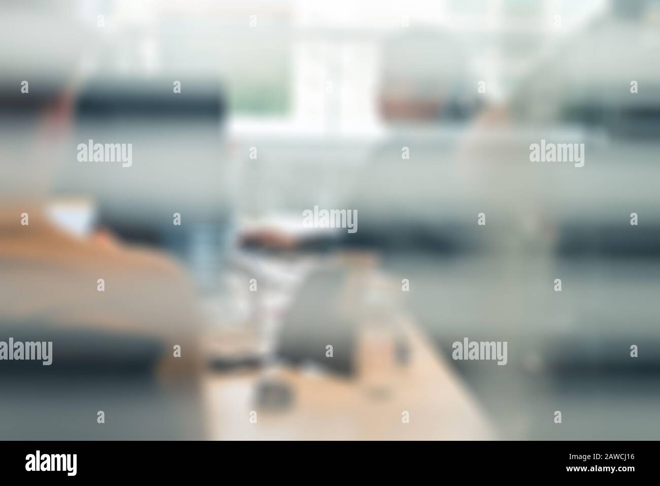 Blurred soft people meeting at table, Blurred background, officer working on computer at office building, Business background Stock Photo