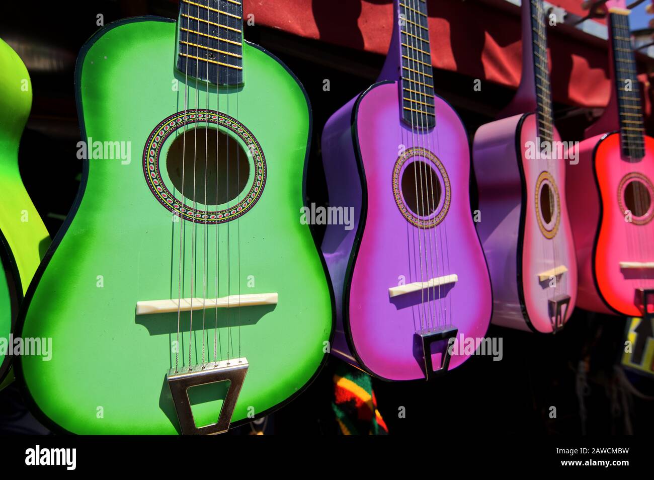 Colorful Mexican guitars on display Stock Photo