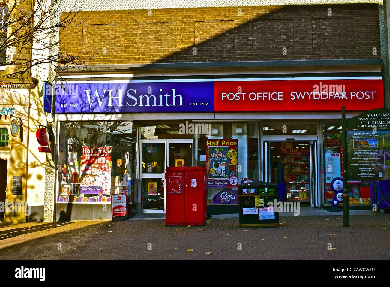 The WH Smith shop in Carmarthen town centre, which now also incorporates the Post Office following closure of old main post office. Stock Photo