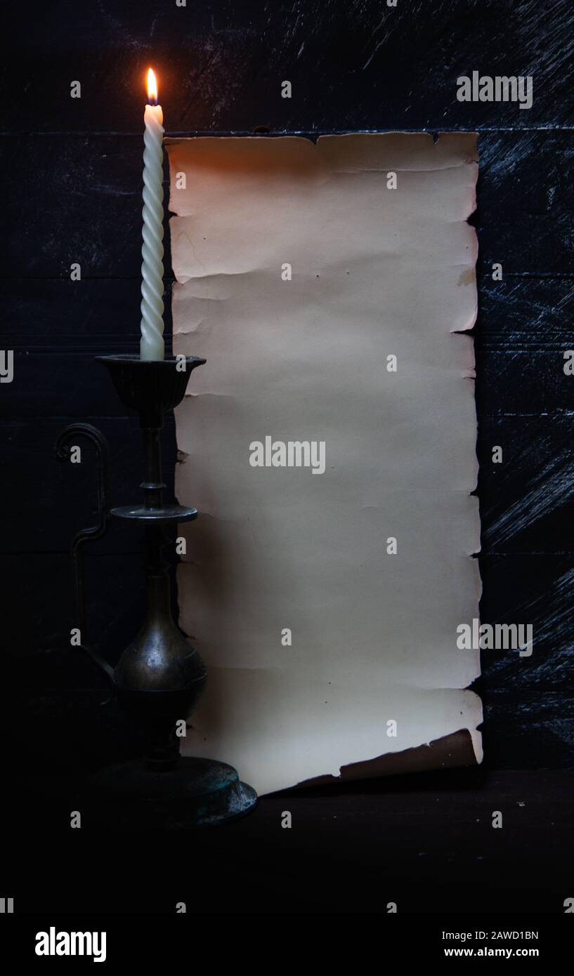 candle and parchment Stock Photo - Alamy