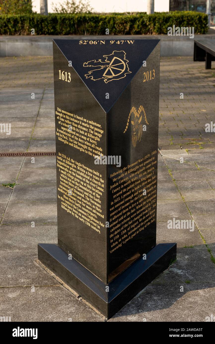 Milestone monument with the County Kerry map and latitude and longitude coordinates for the exact geographic location of Killorglin, Ireland Stock Photo