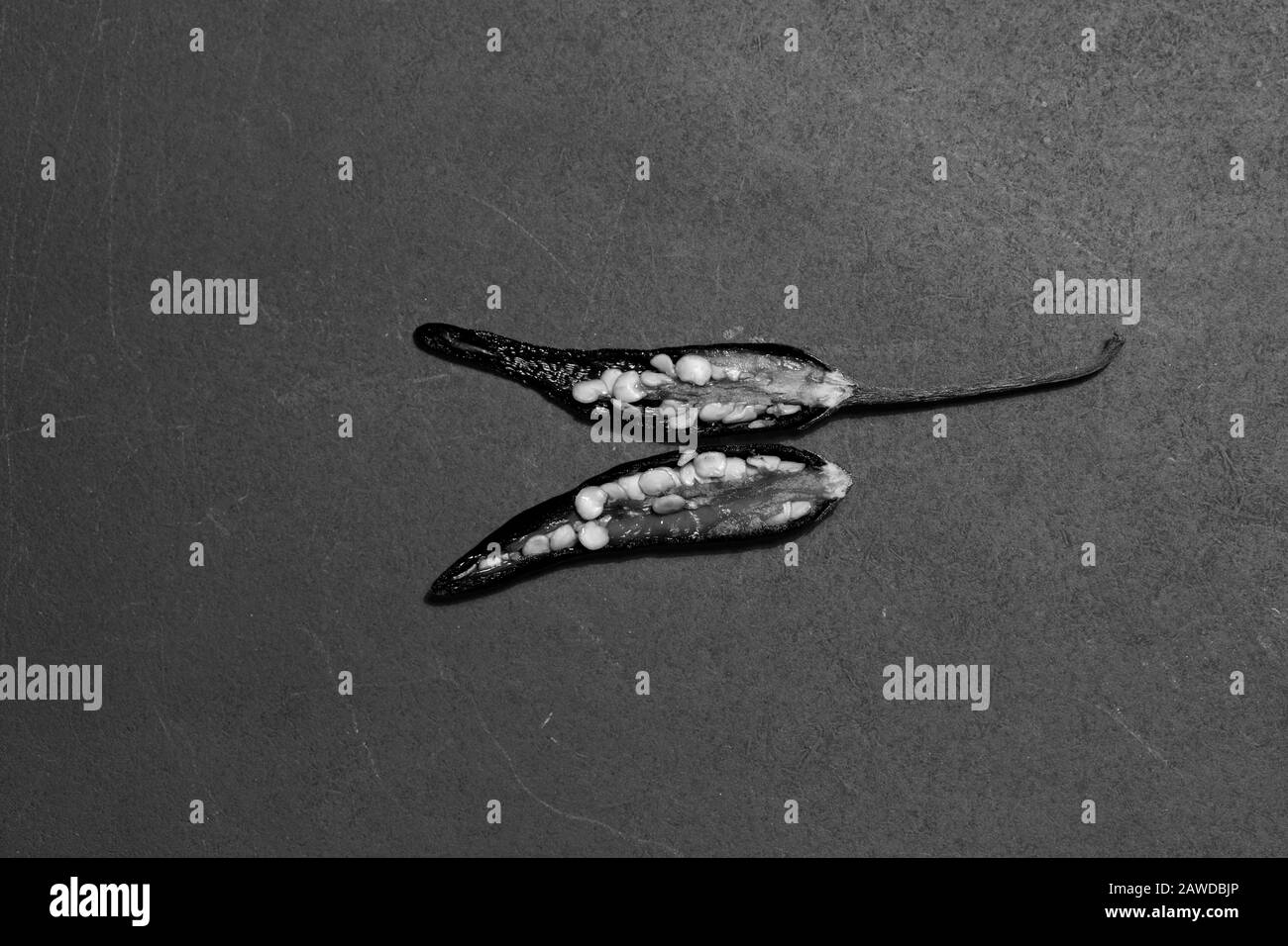 spicy chilis on a board Stock Photo