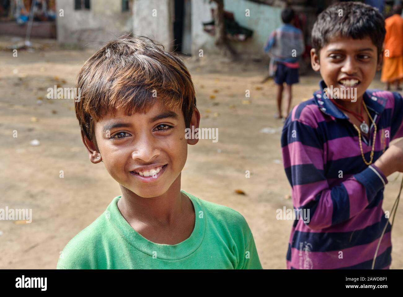Young boy smiling and happy on the street in Kolkata. India Stock Photo