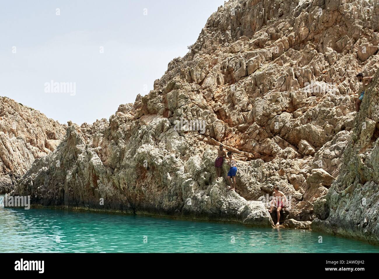 Tourists enjoy seitan limania or Agiou Stefanou, the heavenly beach with turquoise water. Chania, Akrotiri, Crete, Greece, on May 23, 2019. Stock Photo