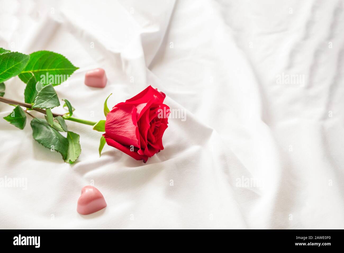 Beautiful romantic morning with red rose and little heart shaped ...