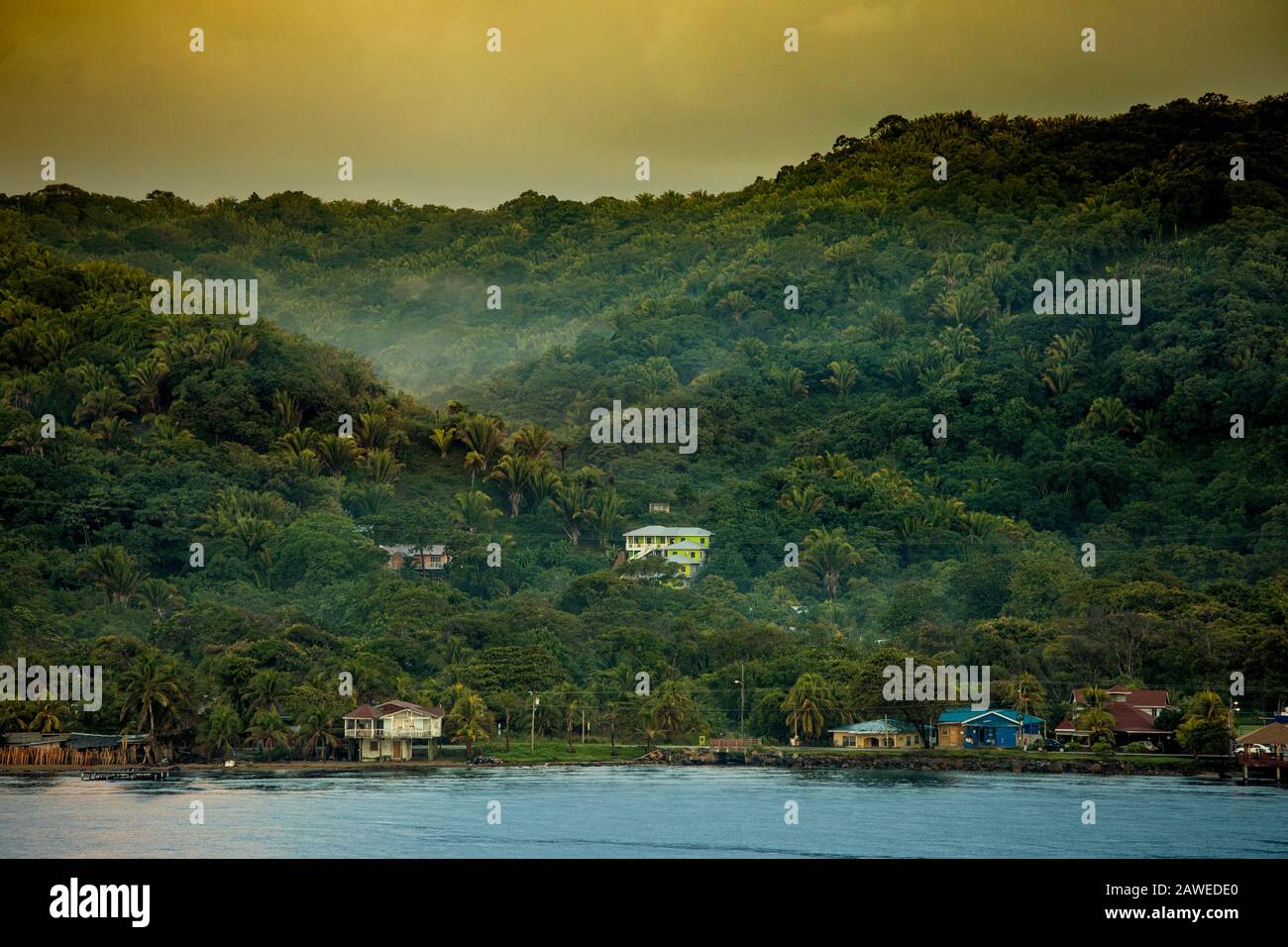 Tropical island if Roatan, Honduras in early morning with haze and humidity. Stock Photo