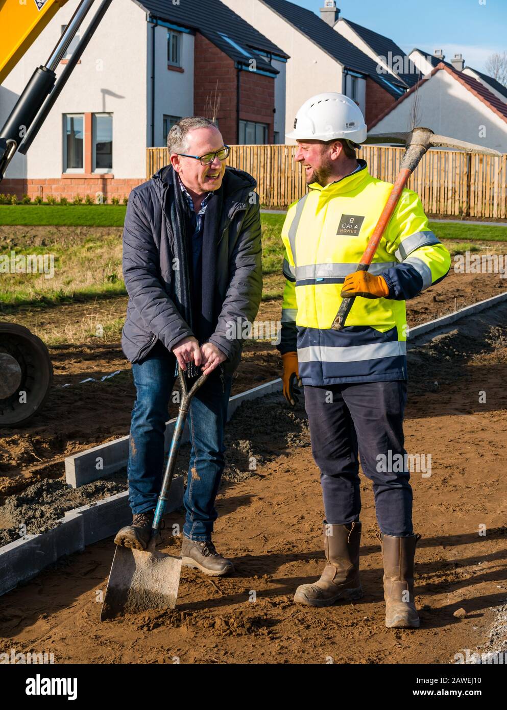 Iain Monk & Jordon McKenna Cala Homes site manager at construction of core path between Gullane & West Fenton, East Lothian, Scotland, UK Stock Photo