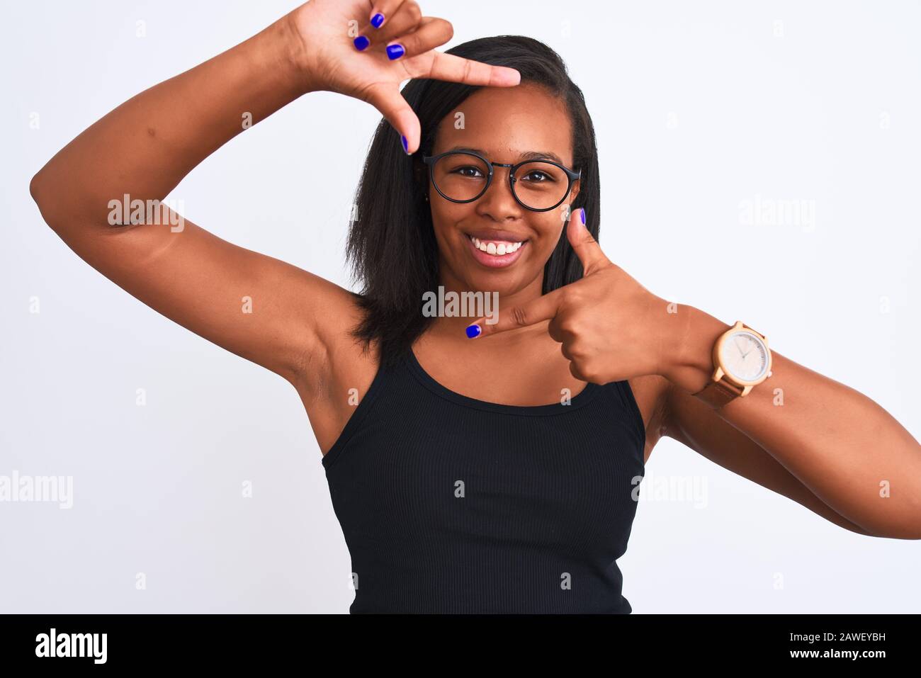 Beautiful young african american woman wearing glasses over isolated ...