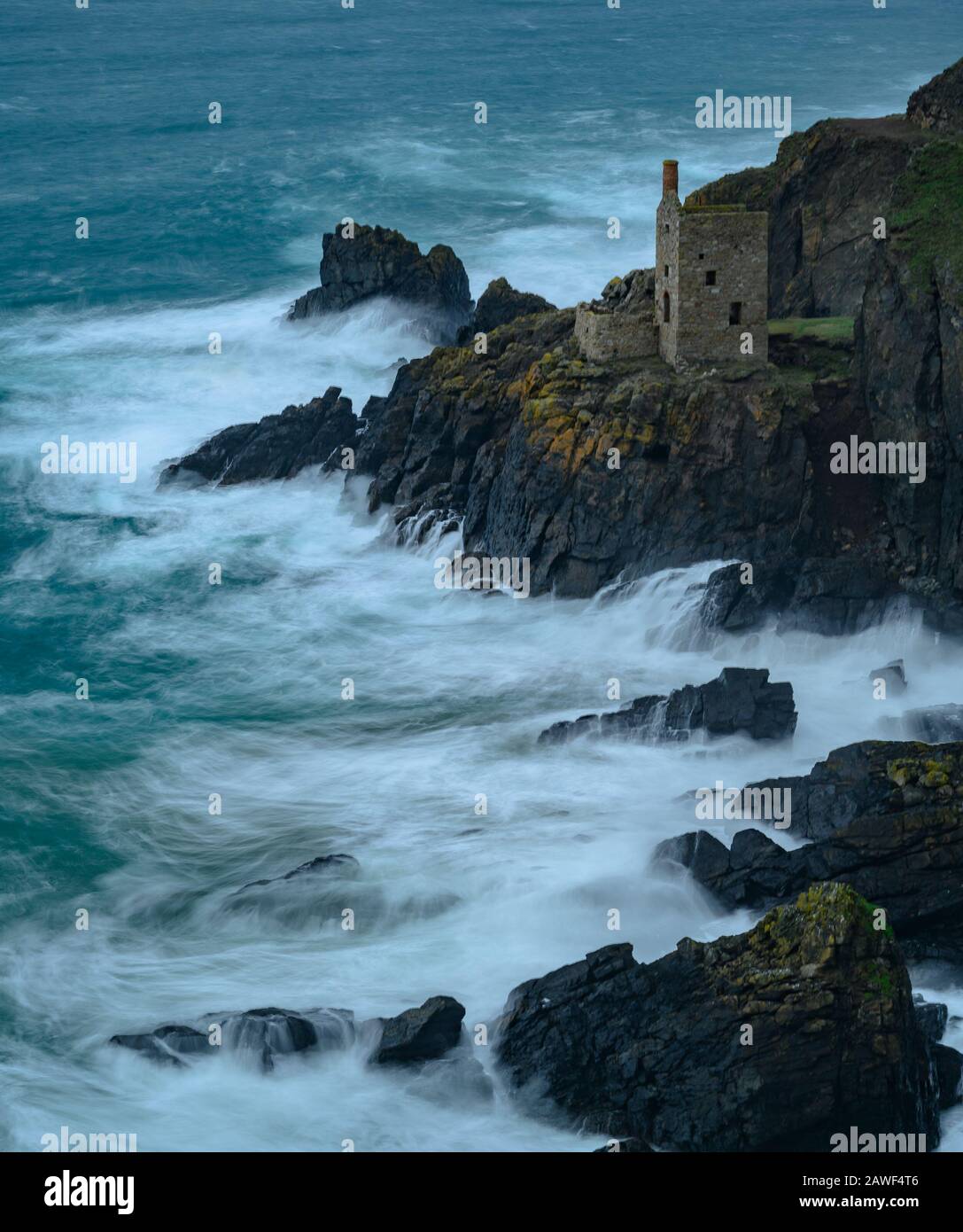 Botallack Mines, Cornwall, 8th February 2020. UK Weather: High winds hit the Cornish coastline bringing Atlantic waves crashing into the rocks at Botallak Mines near St Just, Cornwall on Saturday afternoon ahead of Storm Ciara. Severe weather warnings have been issued with 80 mph winds and heavy rain forecast when the full impact of the storm hits the UK tomorrow. Warnings of widespread travel disruption have been issued. Credit: Celia McMahon/Alamy Live News Stock Photo