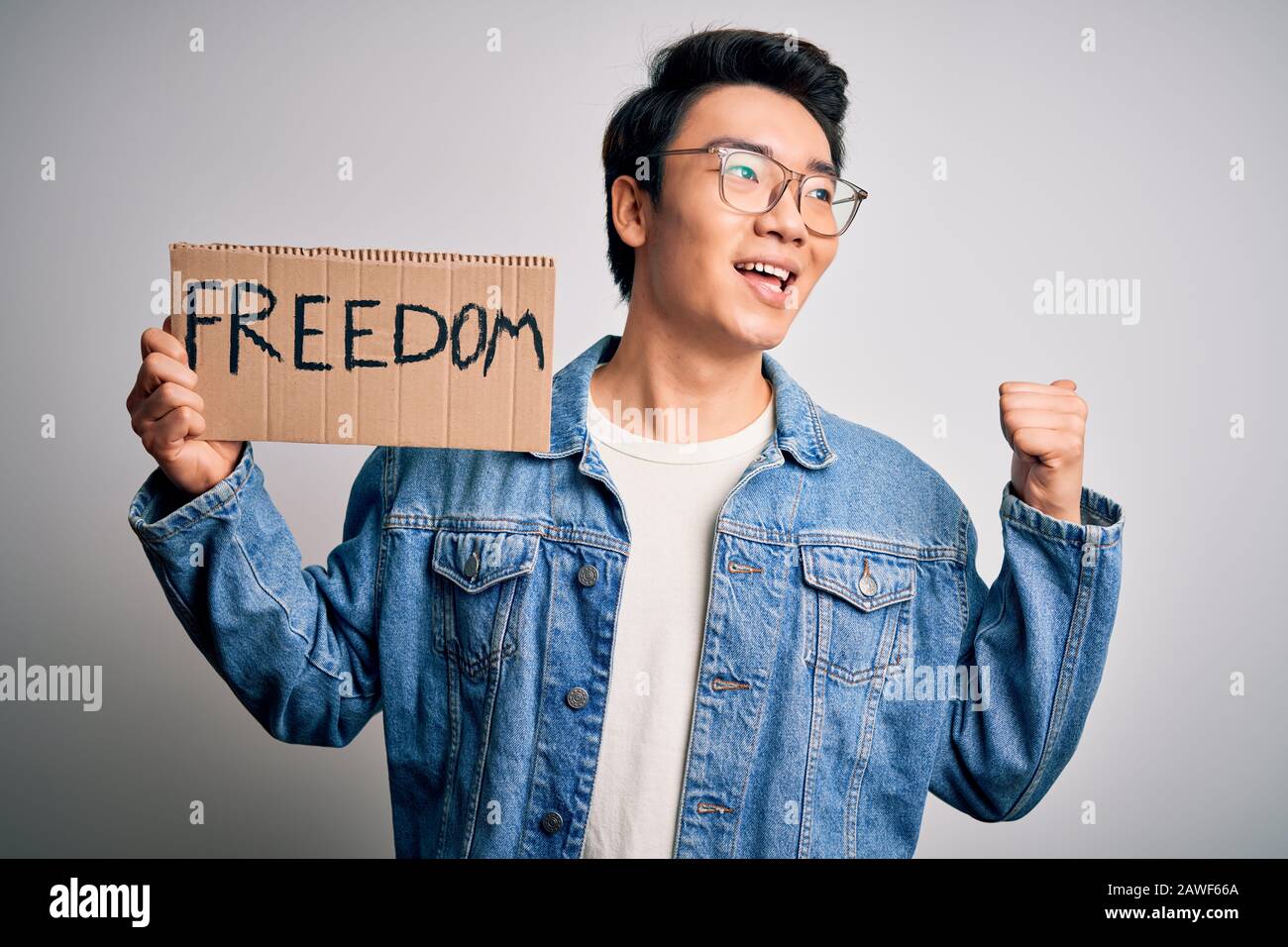 Young handsome chinese activist man protesting asking for freedom ...